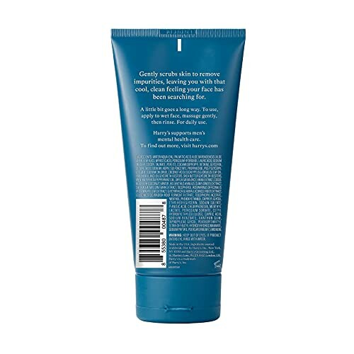 Back view of a blue skincare product tube with text instructions.