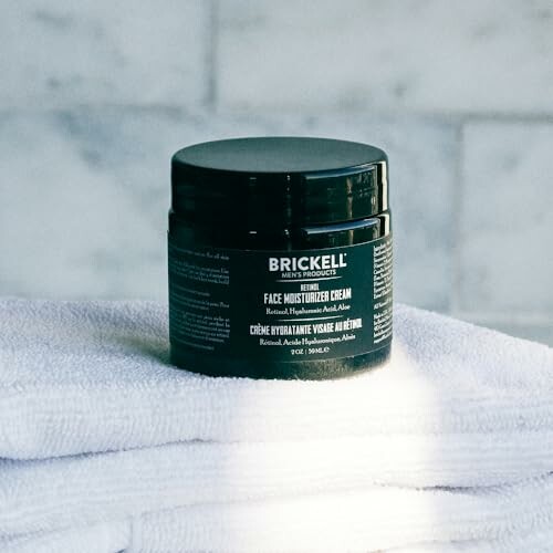 Brickell face moisturizer cream on towels