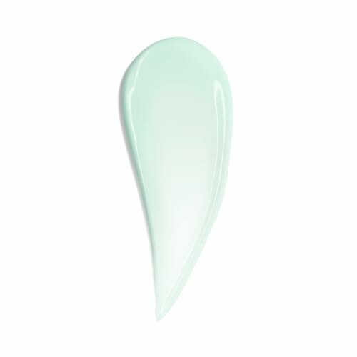 Mint green cream or lotion swatch on white background.