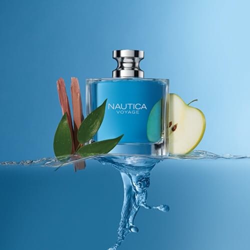 Nautica Voyage perfume bottle with apple and leaves in water splash