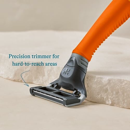 Razor with precision trimmer for hard-to-reach areas.